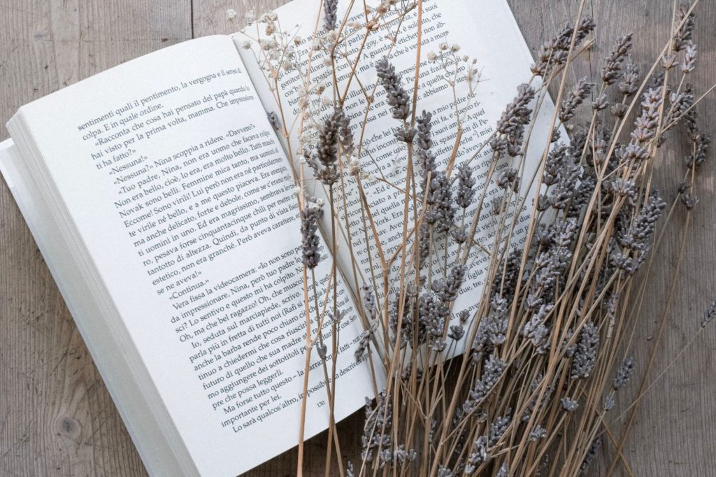 a book on a wooden porch