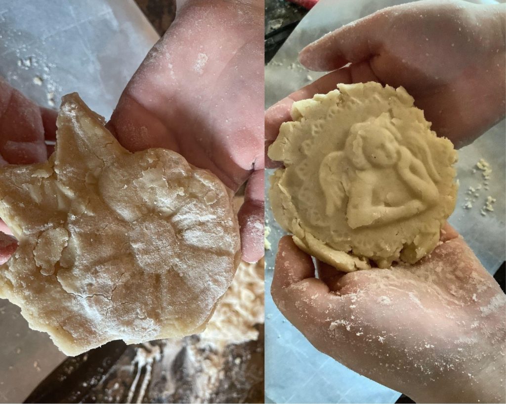 a close up shot of hands kneading dough