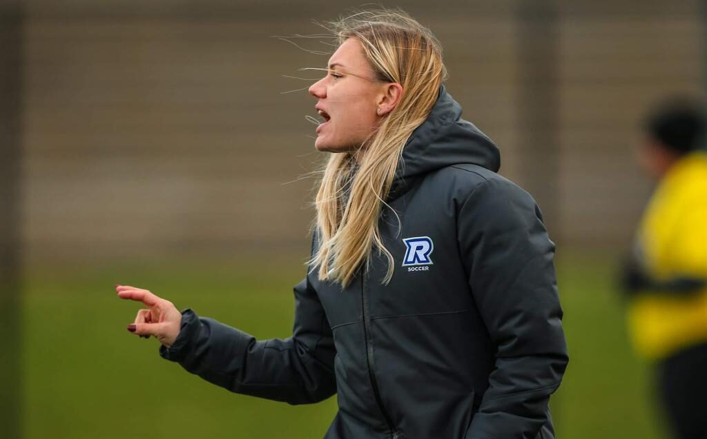 Soccer coach on sidelines