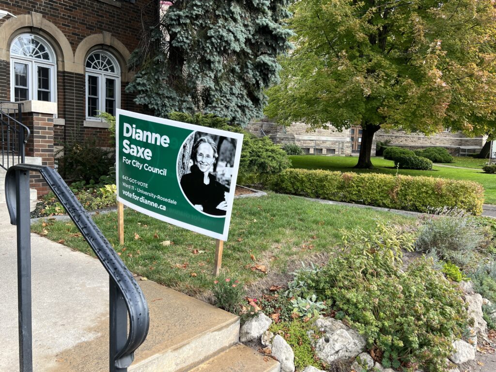 Green sign on grass