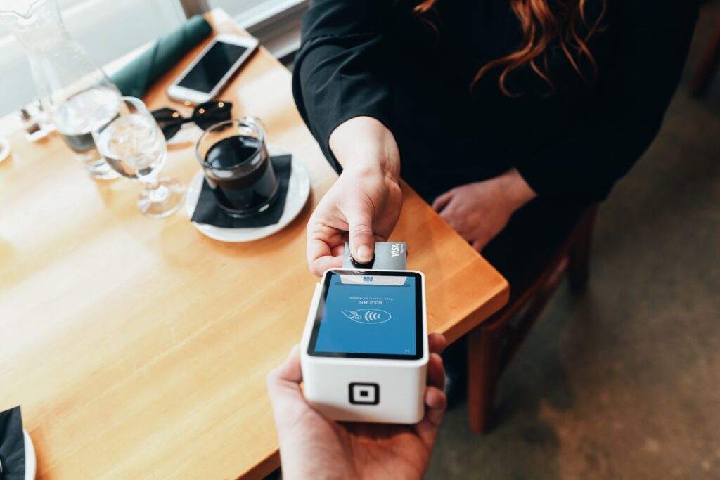 Customer tipping at restaurant.