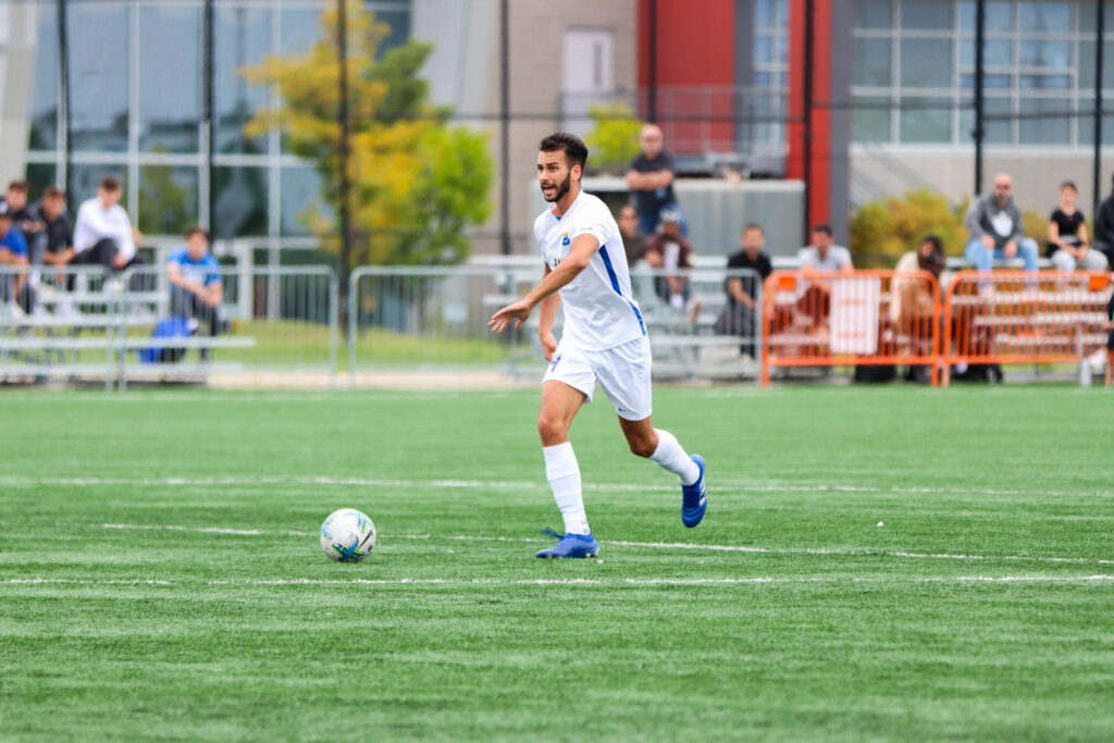 (Third-year student Brandon Barone chases down the ball in the Bold 8-0 win over the Nipissing Lakers at Downsview Park on Sept. 8 (Emily Simonetta/The Bold)