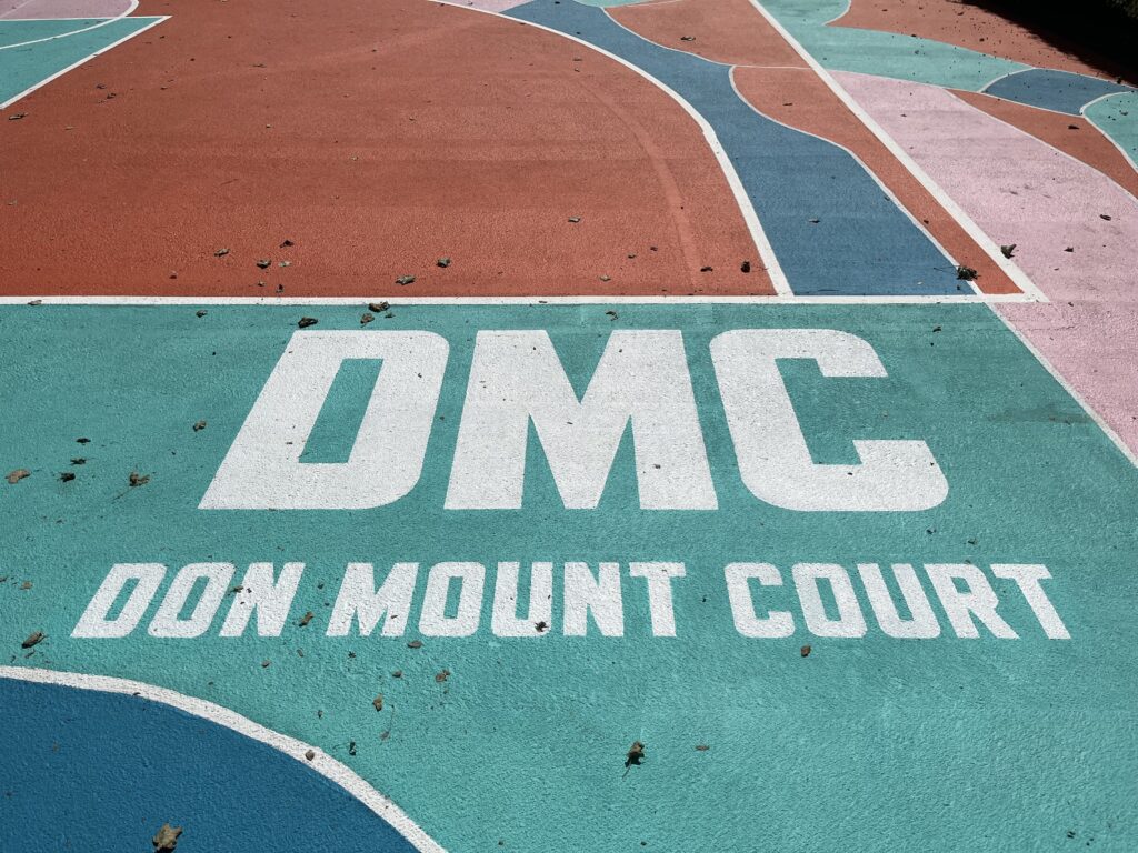 Don Mount Court logo on the court.