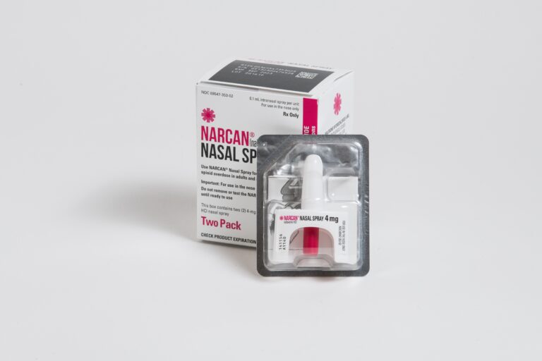 A photo of Narcan nasal spray kit displayed on a white backdrop.