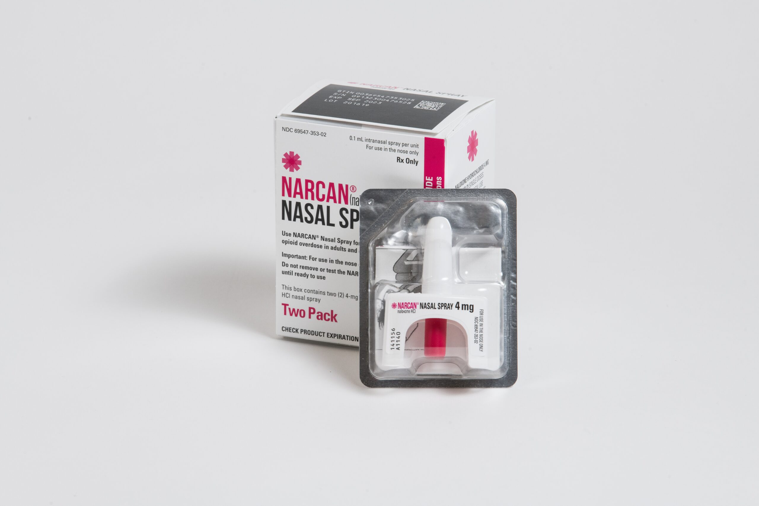 A photo of a Narcan nasal spray kit sitting on a white backdrop.