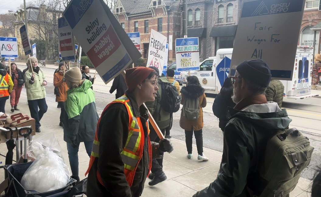 A photo of picketers outside the AGO in Toronto.