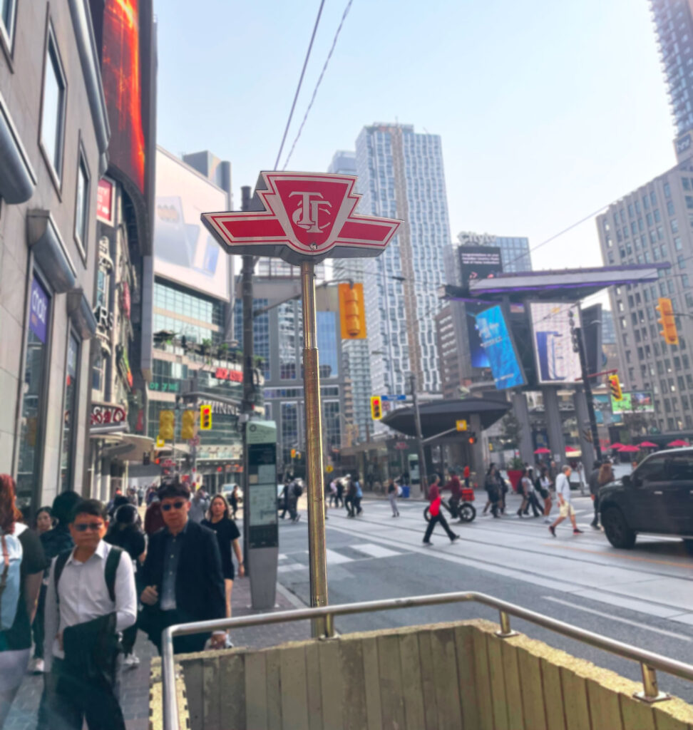 A photo of a TTC pole outside Dundas St.