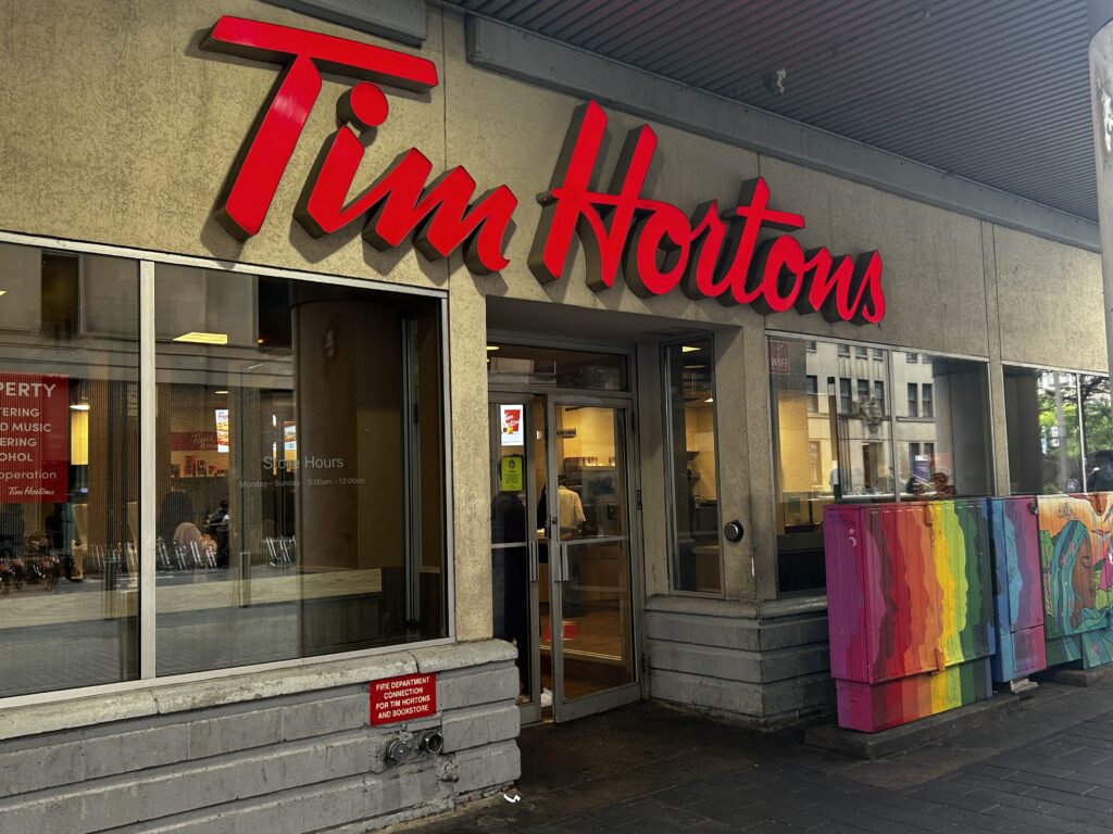 Red sign that reads 'Tim Hortons"