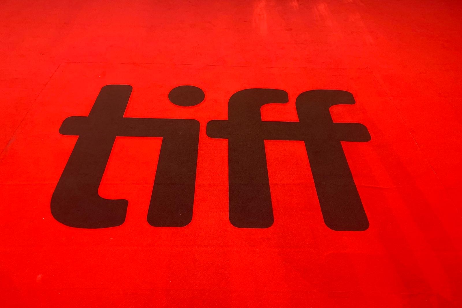 A photo of the red carpet featuring the TIFF logo.