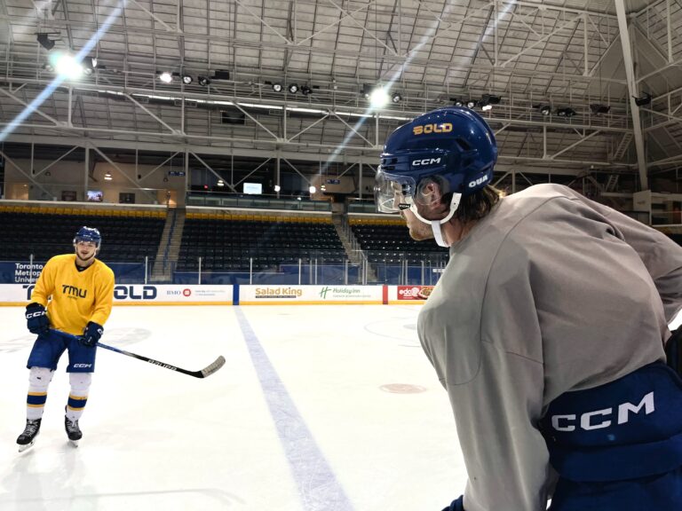 two hockey players, men, skating at the Mattamy Athletic Centre