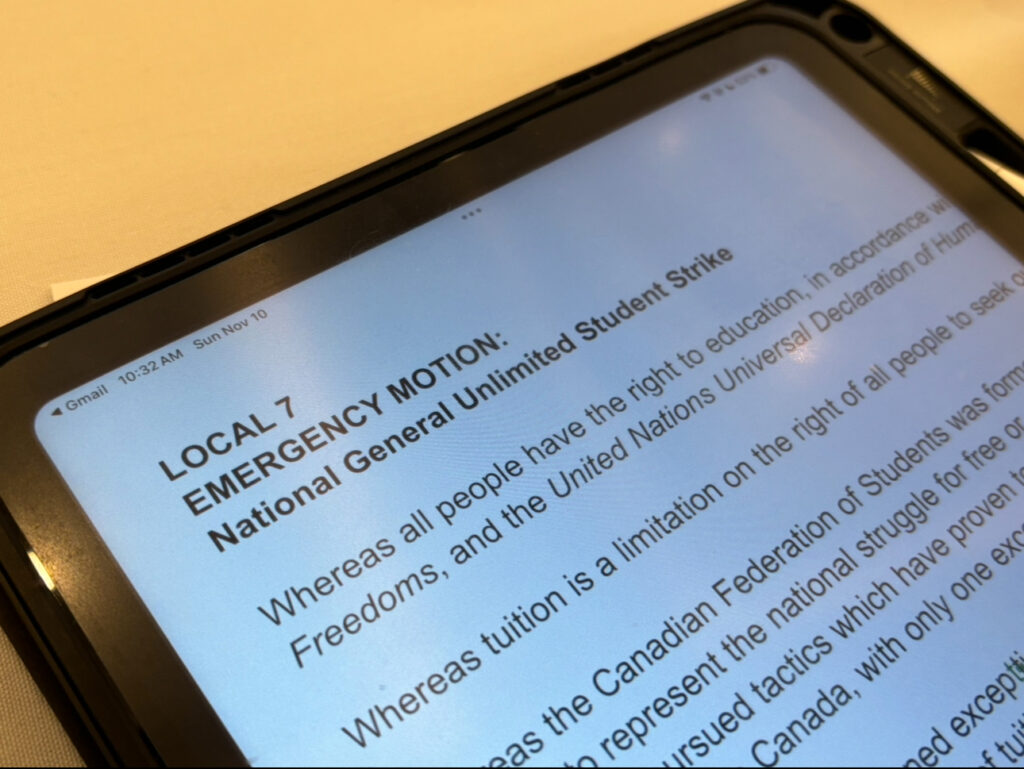 iPad showing a general strike motion document.
