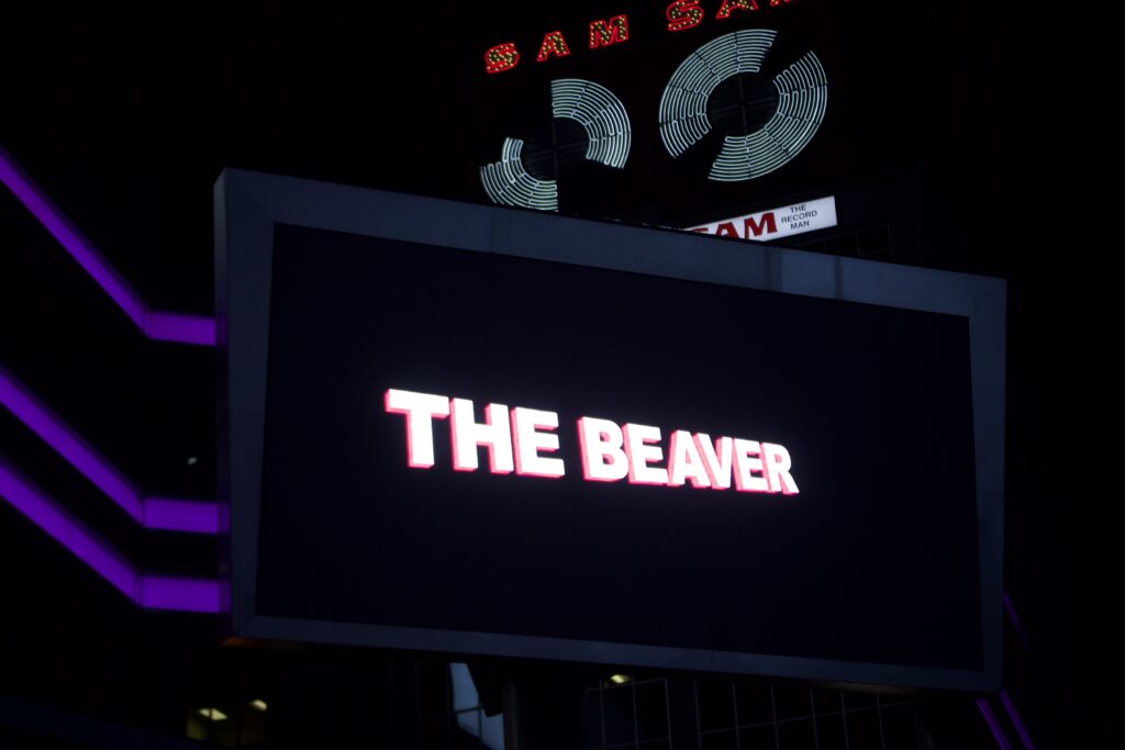 One of the screens displaying the "Disappearing Acts" video at Nuit Blanche. The screen reads: "The Beaver," one of the clubs featured.