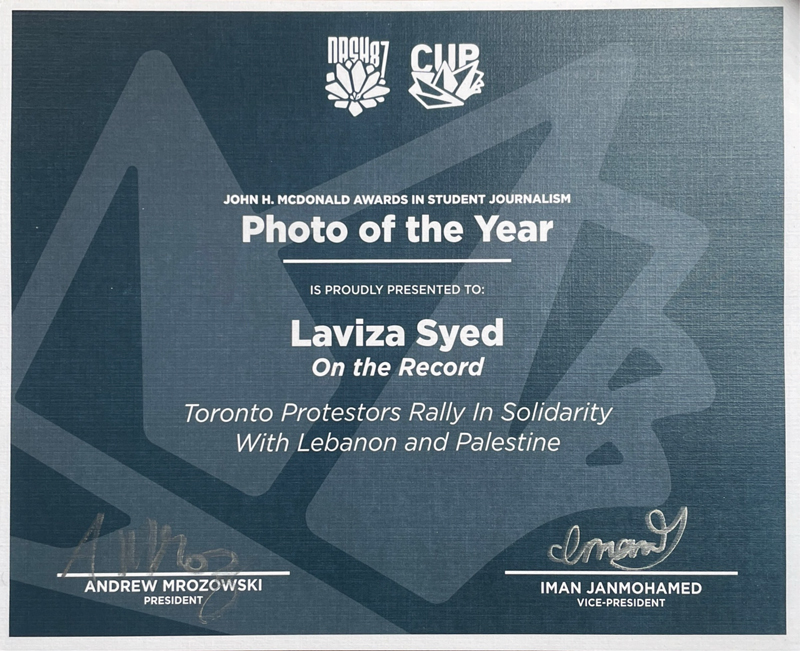 CUP Photo-win-2025-sm A blue-grey certificate with white writing for a Photo of the Year award from CUP.