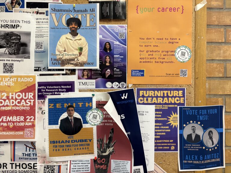 Posters overlap on bulletin board