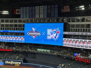 LED video board screen inside baseball stadium.