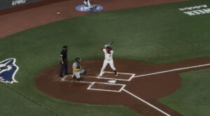 Baseball player batting. 