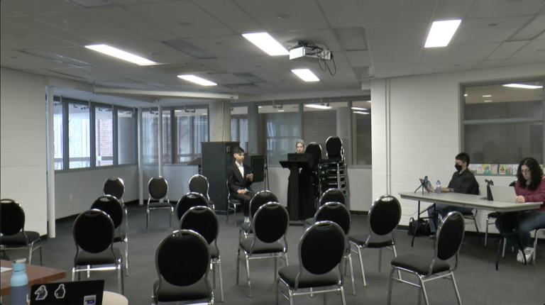 An event space with a few people.