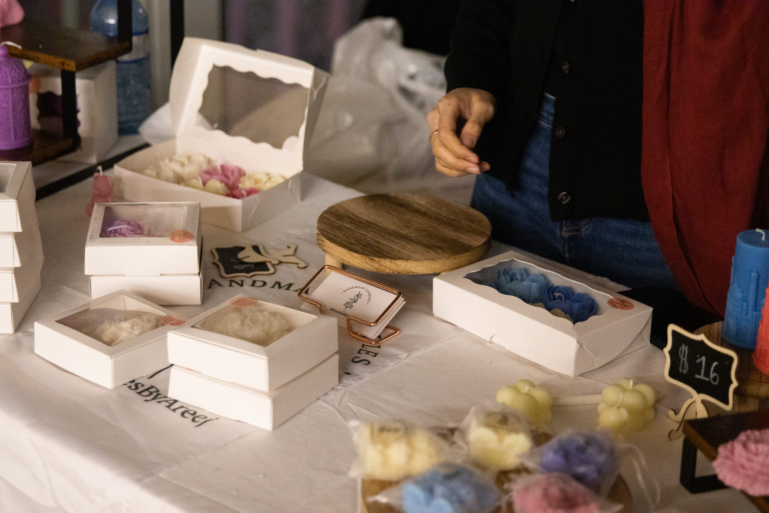 Close up short of candles in beautiful boxes.